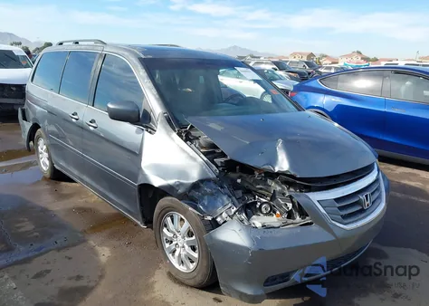 2010 Honda Odyssey Ex-L z USA, uszkodzony, nr VIN 5FNRL3H73AB057149